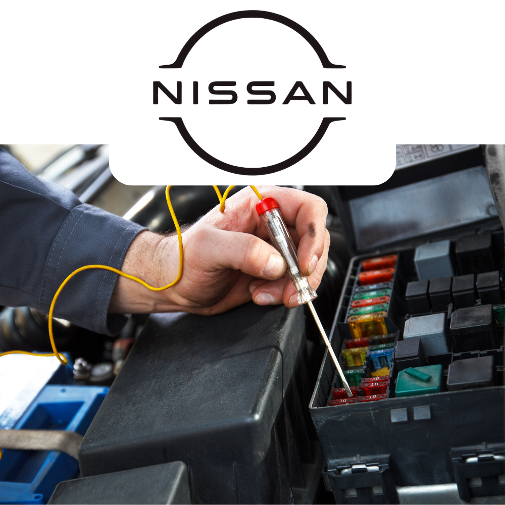 Person working on a car's fuse box with Nissan logo above