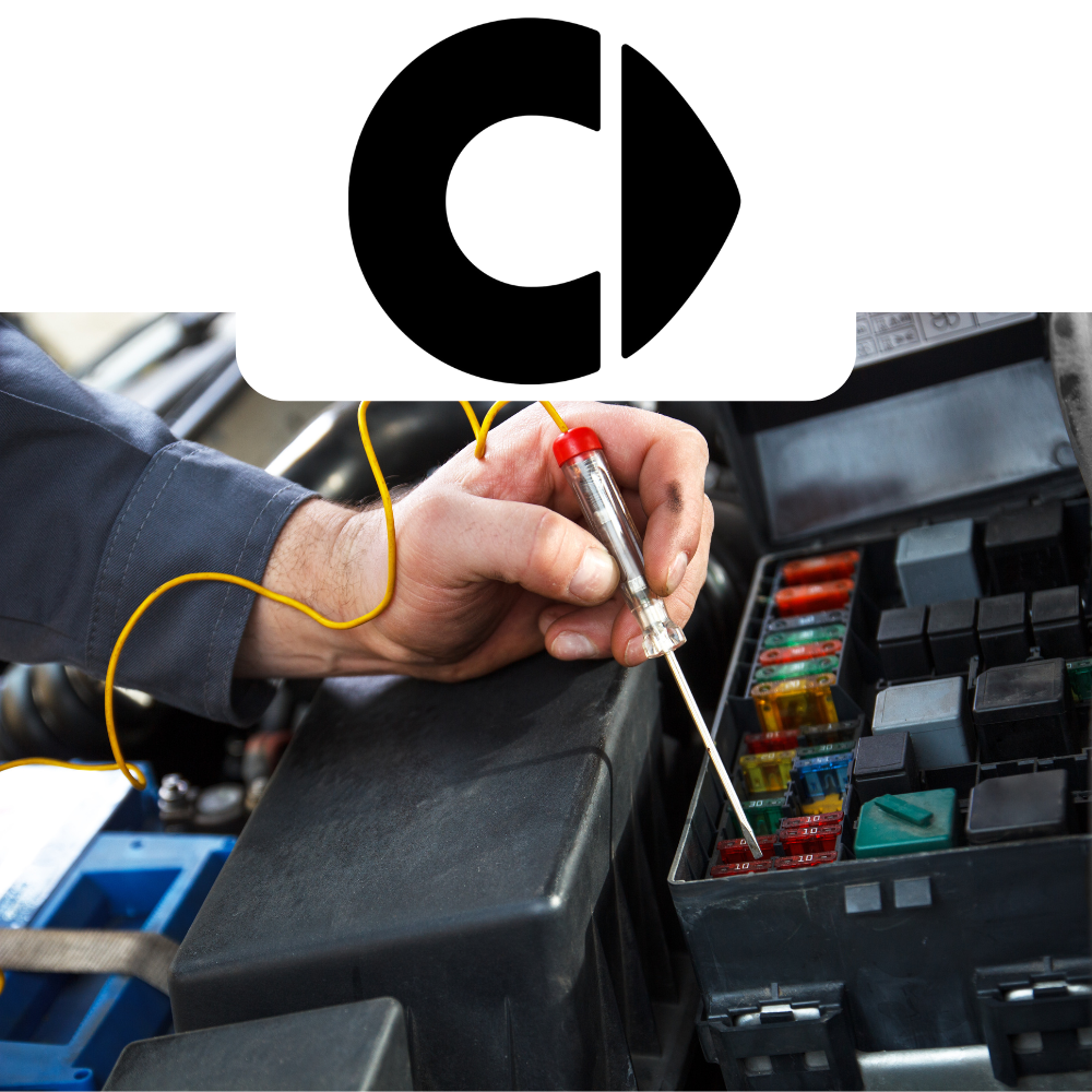 Person working on a car's fuse box with a screwdriver, smart logo above.
